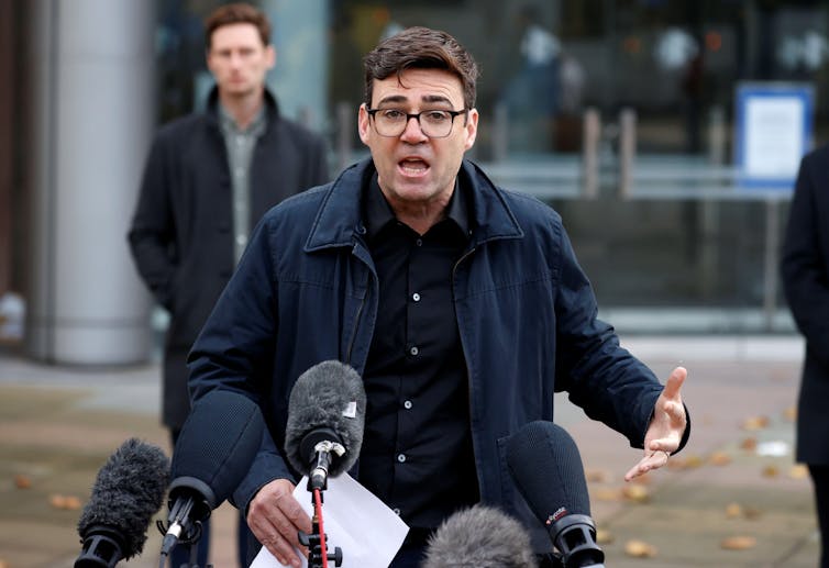 Manchester mayor Andy Burnham giving a press conference.