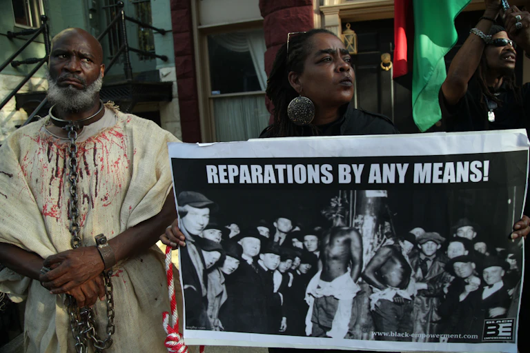 Activists stage a protest.