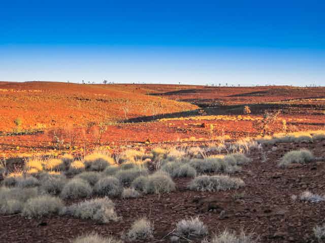 A vast expanse of the West Australian outback in the sun.