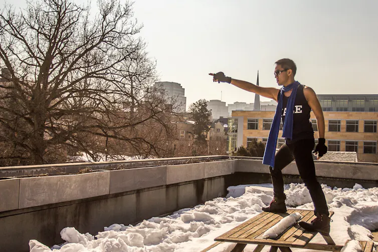 A man on a roof.