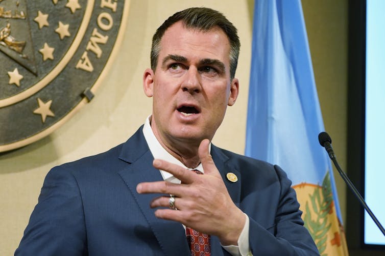 Oklahoma Gov. Kevin Stitt speaks at a news conference about his state's budget, which was healthier than anticipated.