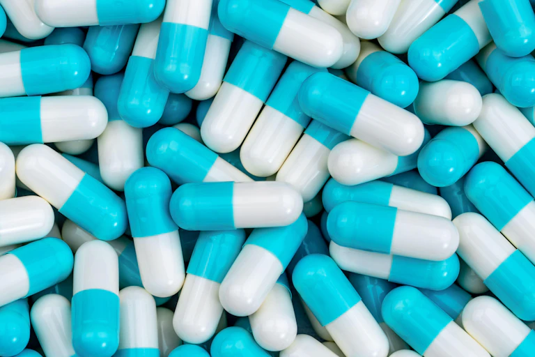 Blue and white pills.