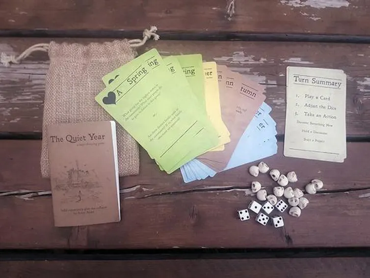 Papers and a bag on a table.