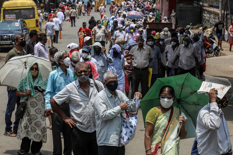Residents of Mumbai line up for a vaccine.