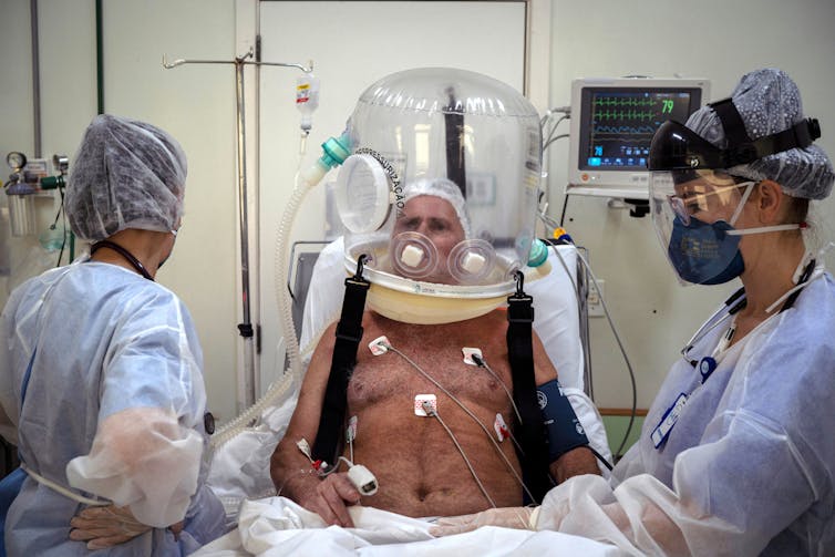 A Brazilian man in hospital being treated for COVID-19.