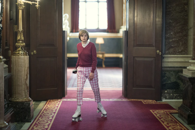 Woman rollerblades through grand hosue.