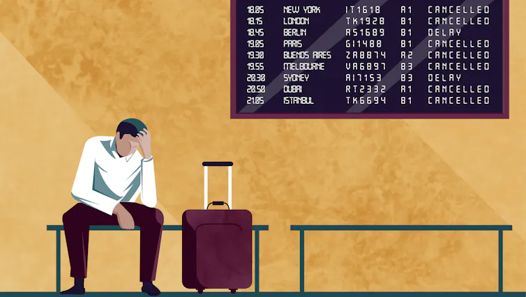 A cartoon of a man sat with a suitcase under an airport departures board.