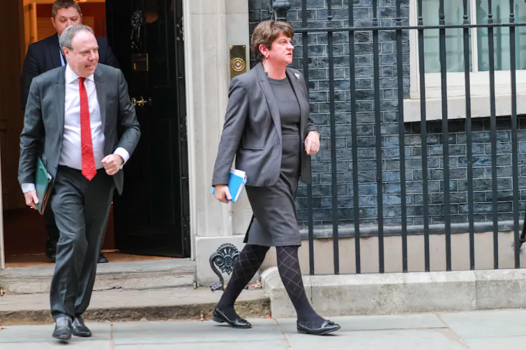 Nigel Dodds and Arlene Foster walking out of 10 Downing Street.