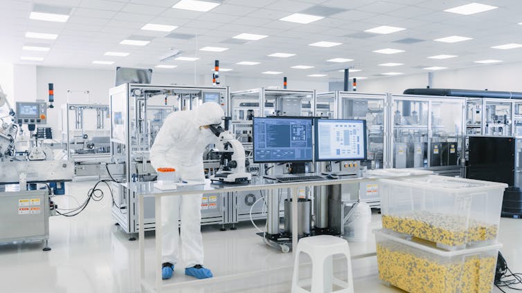 A technician at work in a lab developing vaccines