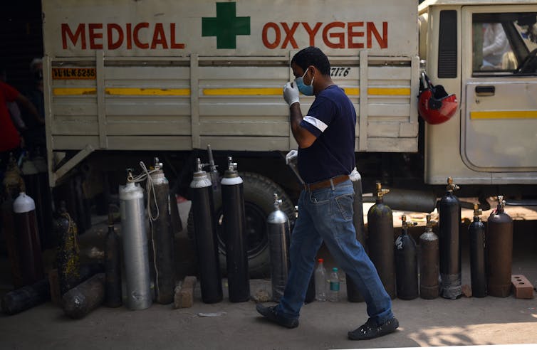 Oxygen cylinders waiting to be filled in New Delhi