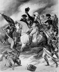 An illustration of Gen. George Washington on a horse holding his hat as he leads his men in a battle in 1777