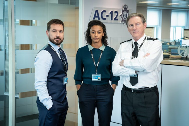 Three police officers.