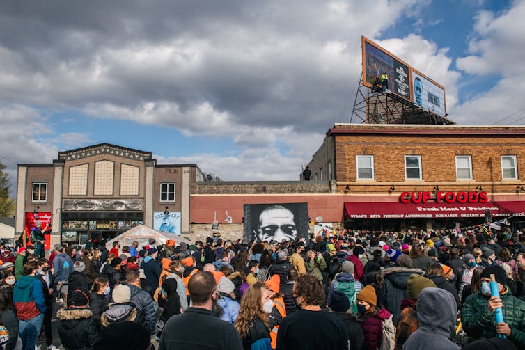People gathered at the intersection of 38th Street and Chicago Avenue in Minneapolis after the guilty verdict in the Derek Chauvin trial on April 20, 2021.