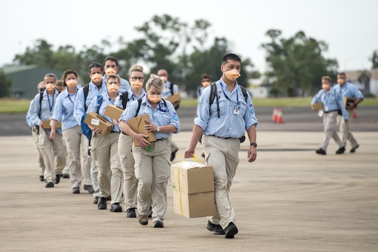 AUSMAT team departing for PNG.