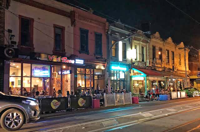 streetside dining at night in Brunswick Street, Fitzroy