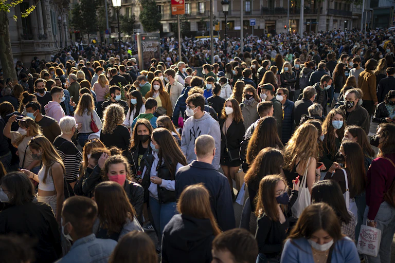A crowd of people in Barcelona, Spain