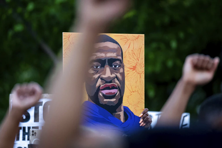 People march through the streets of Atlanta after Derek Chauvin was found guilty of three counts in the death of George Floyd, Tuesday, April 20, 2021. (AP Photo/Ben Gray)