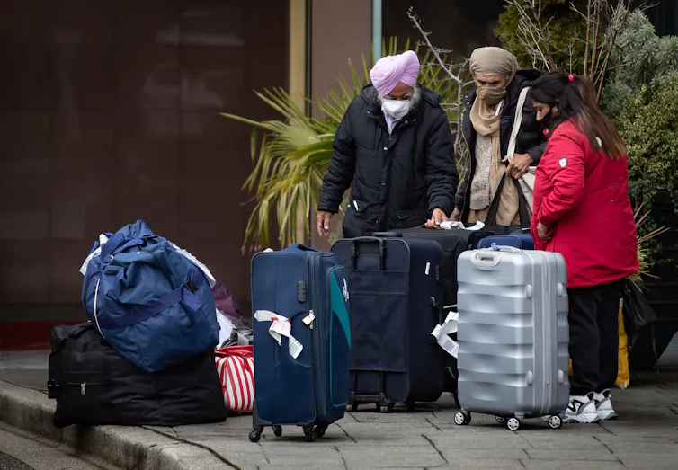 People with suitcases