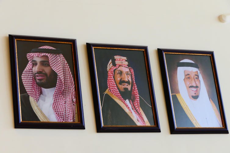 Portraits of three members of the Saudi Arabian royal family, the House of Saud.