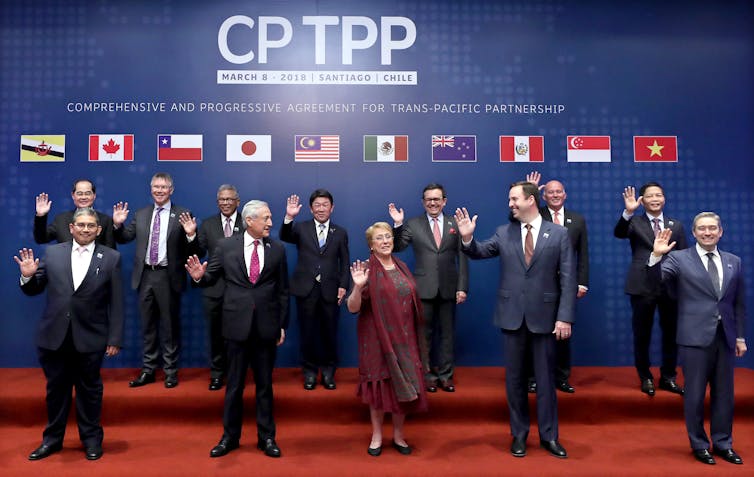 CPTPP member leaders posing for a group shot