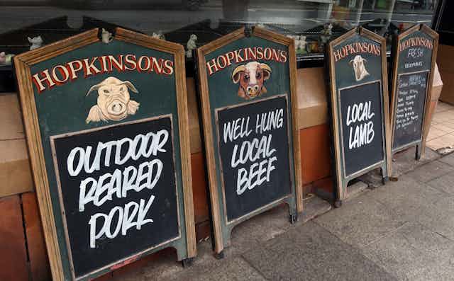 Butchers signs: local lamb, local beef, outdoor pork