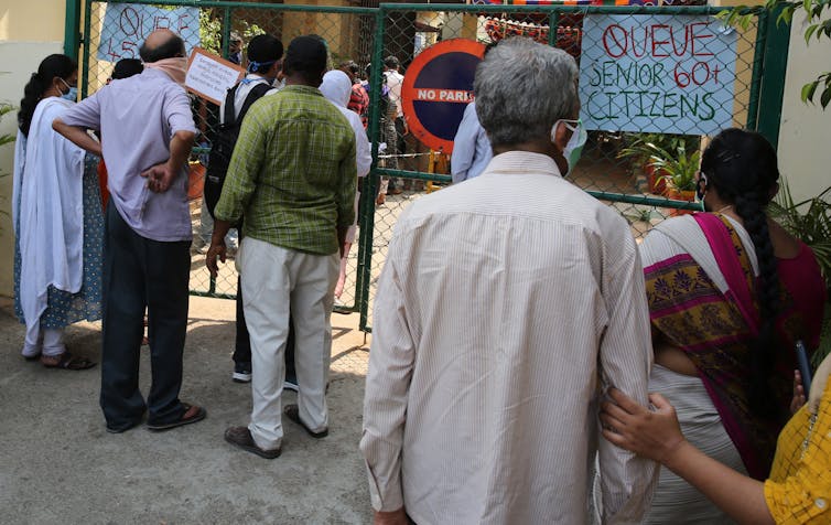 Indians lining up for vaccine.