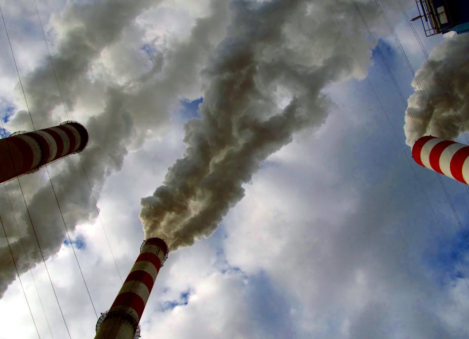 Smoke coming out of chimneys.