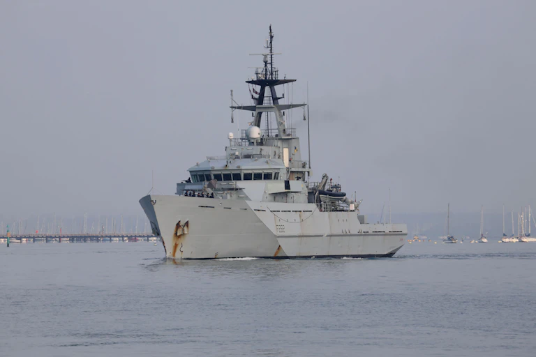 A medium sized grey military ship