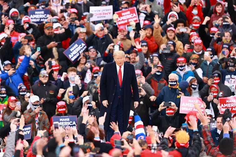 Trump in front of a crowd