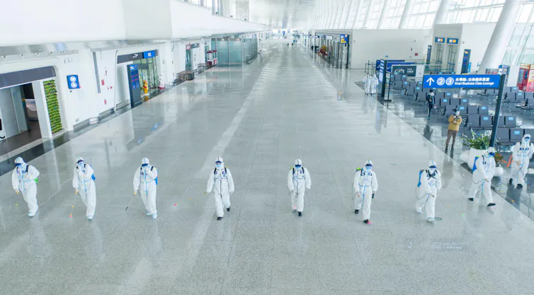 Firefighters conduct disinfection at Wuhan Tianhe International Airport in April 2020