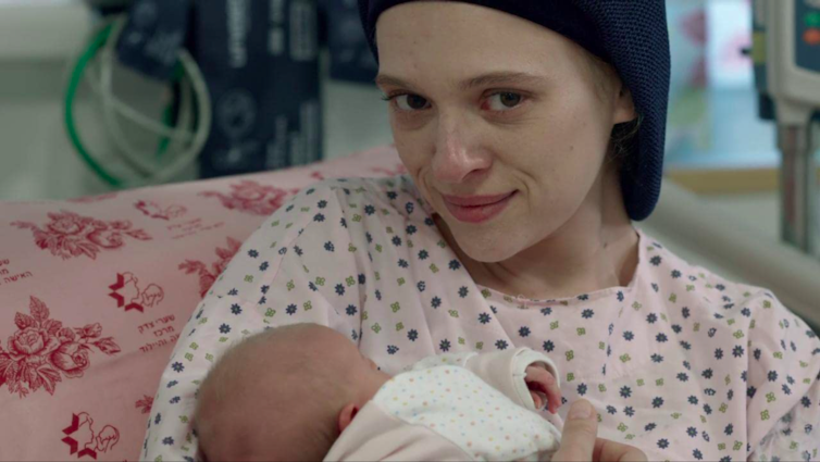Ultra-Orthodox woman holds baby in press photo for Netflix show