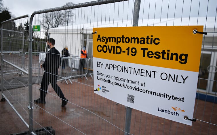 Man enters a temporary COVID-19 testing centre