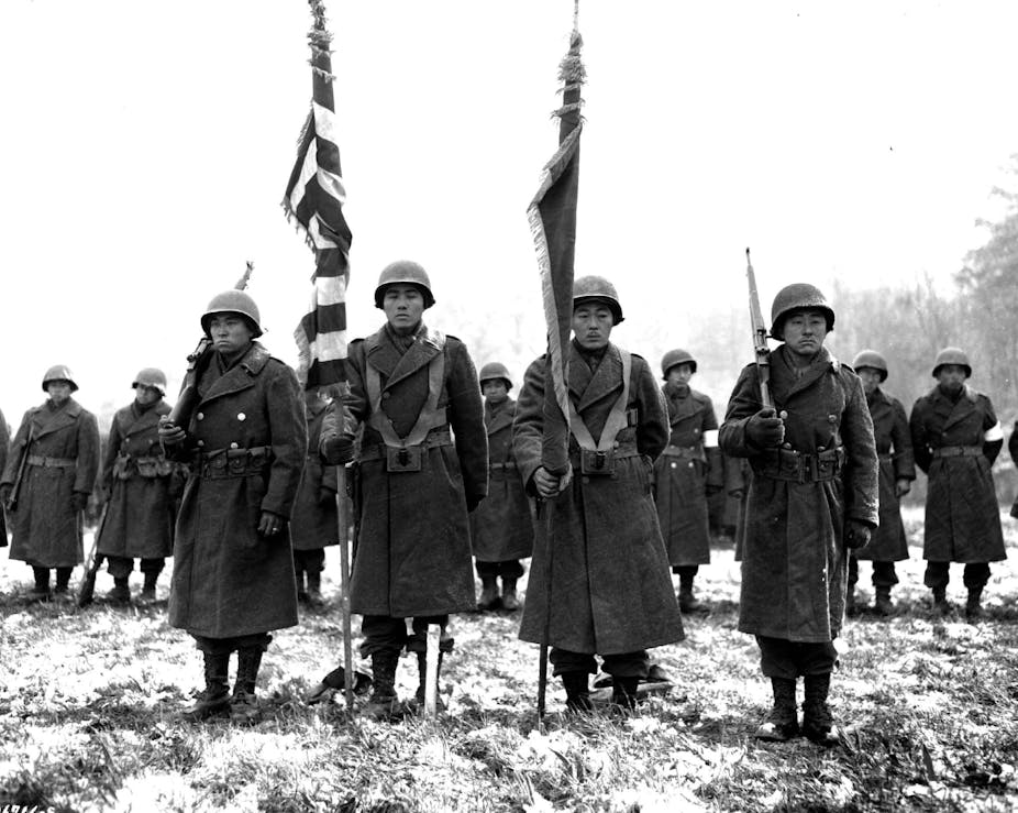 Soldiers stand in formation 