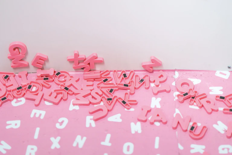 Magnet letters in a pile on the ground