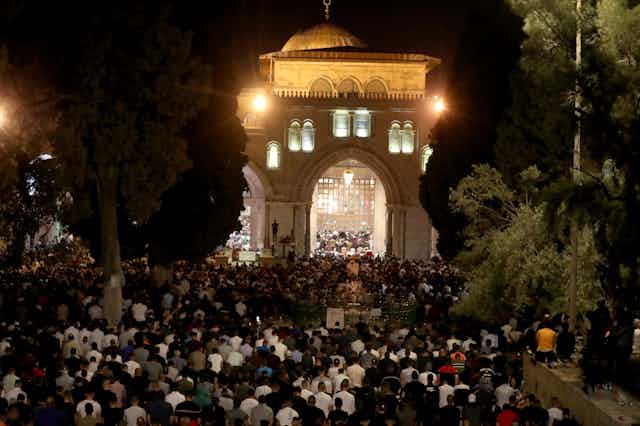 Thousands of Palestinian Muslims praying at al-Aqsa Mosque in Jerusalem, one of Islam's holiest sites, May 8 2021.