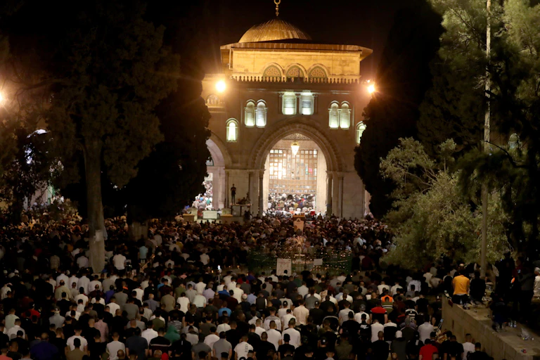 Thousands of Palestinian Muslims praying at al-Aqsa Mosque in Jerusalem, one of Islam's holiest sites, May 8 2021.