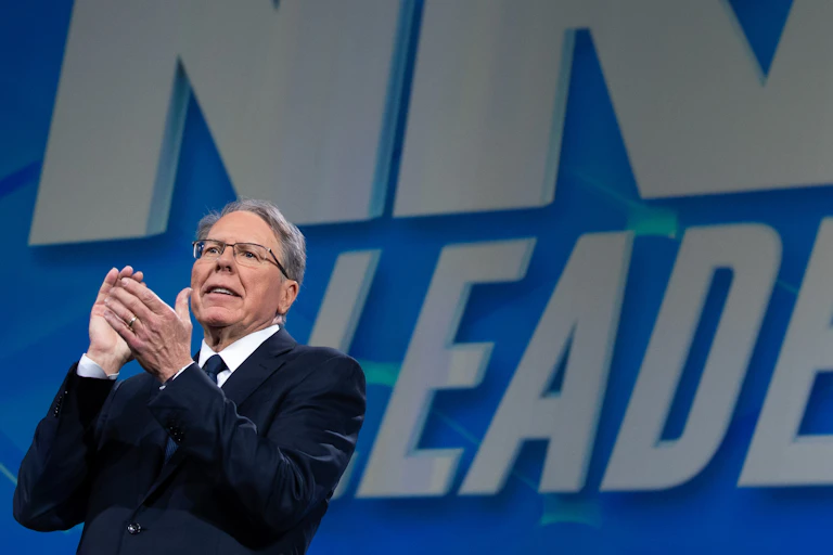 NRA chief Wayne LaPierre, applauding