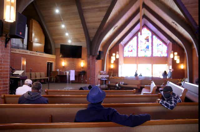 Congregants gather inside a church in Los Angeles, California.