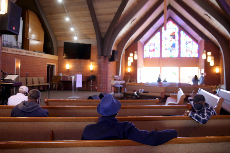 Congregants gather inside a church in Los Angeles, California.