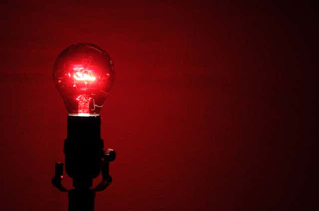 Red light bulb switched on