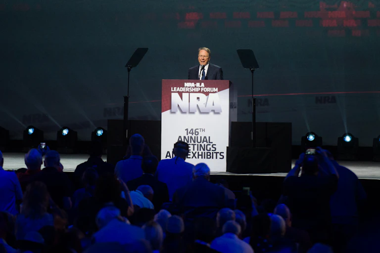NRA leader Wayne LaPierre, at a podium