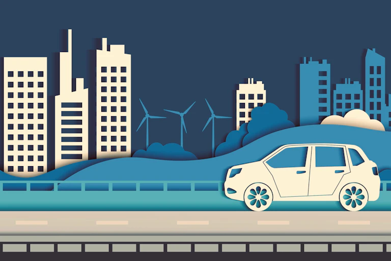 car against cityscape and wind turbines