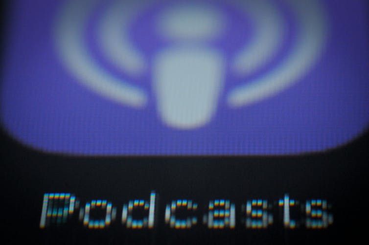 A zoom-in of Apple's purple podcast icon.