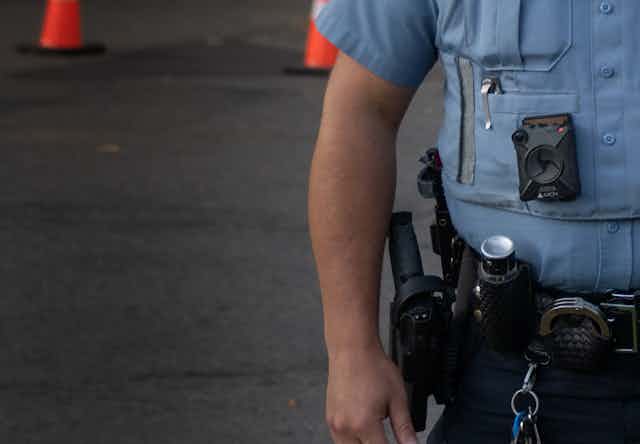 A police officer wears a body camera