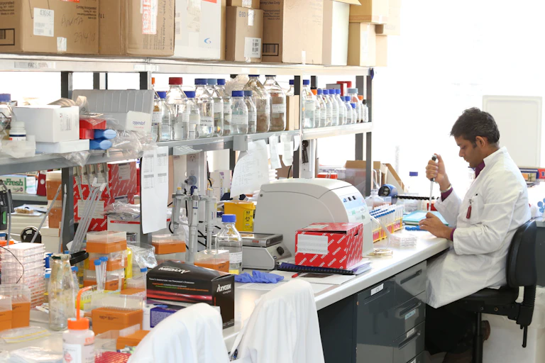 Male scientist working at lab bench