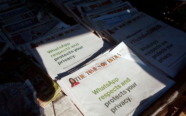 Times of India newspapers featuing WhatsApp's front page adverts