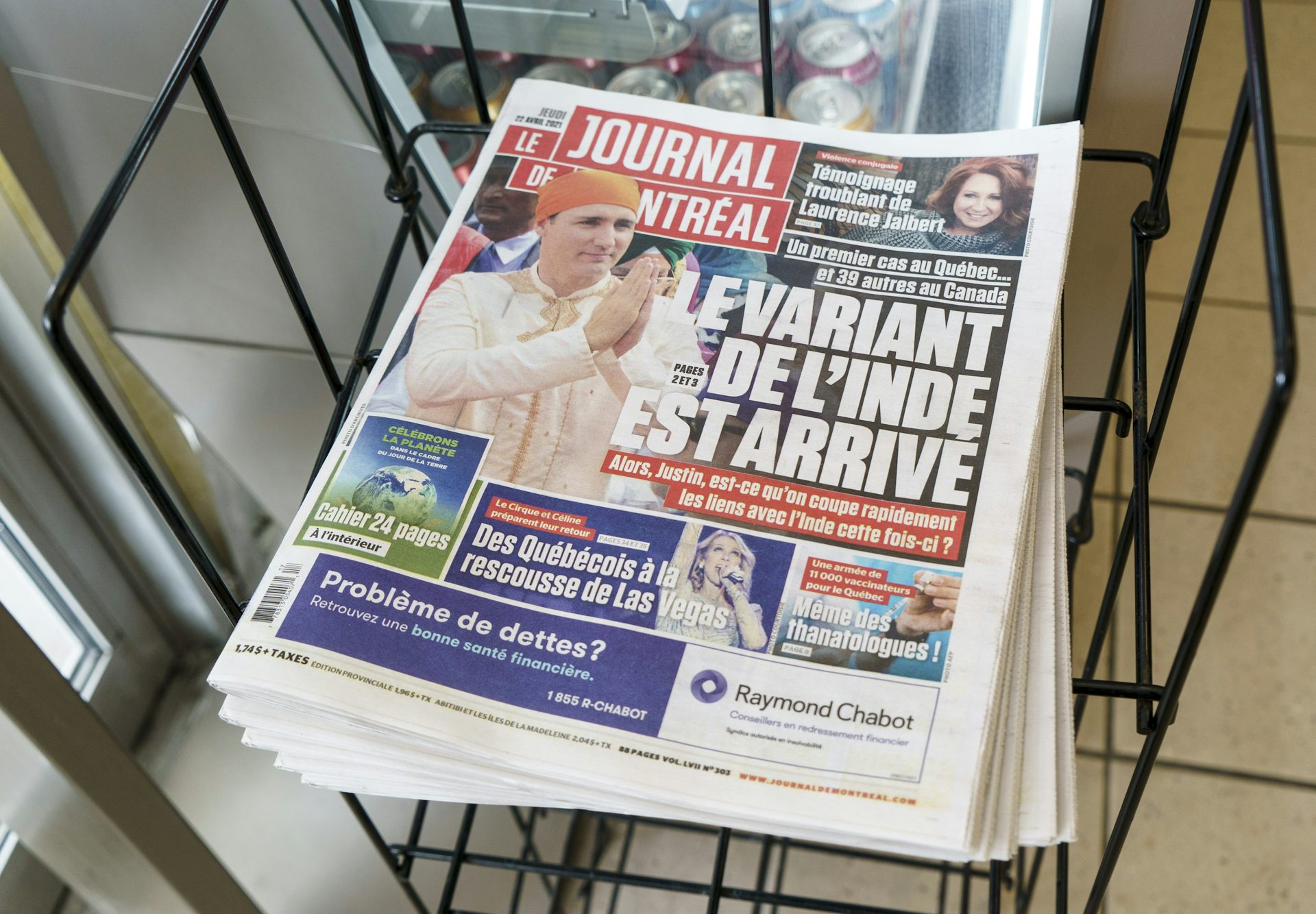French newspaper shown with image of Justin Trudeau dressed in traditional Indian clothing