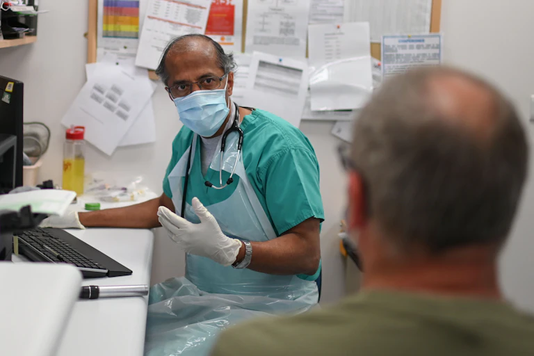 A doctor and a patient talking