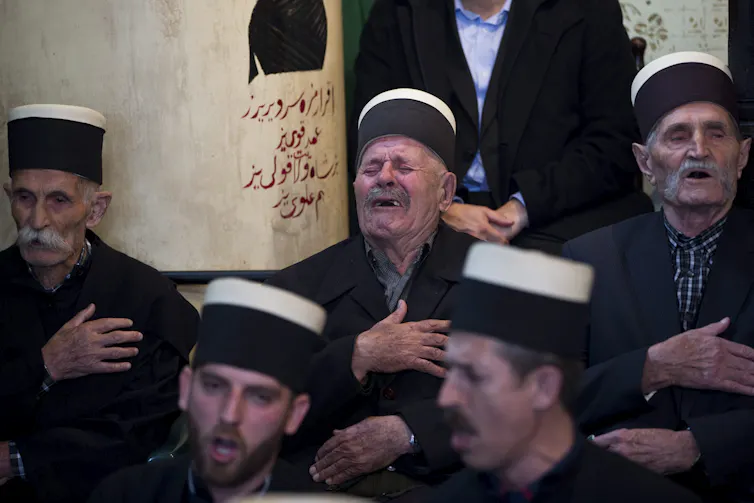 Dervishes pray
