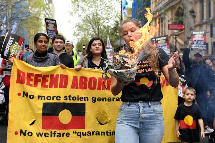 Protesters rally.